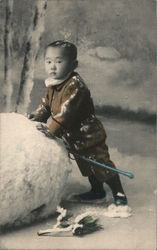 A small child playing with snow Japan Postcard Postcard Postcard