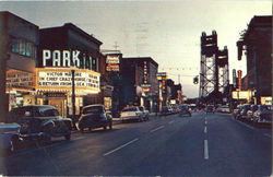 The Glow Of Evening Blending With Neon Lights, Main Street Welland, ON Canada Ontario Postcard Postcard