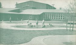 Sunny days bring dozens of youngsters to these wading pools provided for war workers’ children. Vancouver, WA Postcard Postcard Postcard