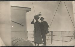 A n Unidentified Man and Woman on the Unidentified Deck of a Boat Cruise Ships Postcard Postcard Postcard