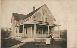 House with Man, Woman and Baby Buildings Postcard Postcard Postcard