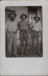 Three Men with Cowboy Hats on a Porch Postcard