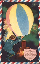 Boy and Girl Lighting a Paper Lantern Postcard