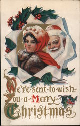 Santa and a Woman in a Wreath Santa Claus Postcard Postcard Postcard