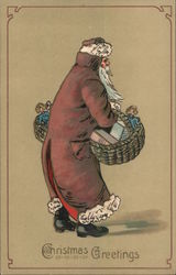 Santa carrying two baskets of toys and wrapped presents. Postcard