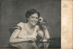 A Woman Sitting Talking on a Telephone Telephones Postcard Postcard Postcard