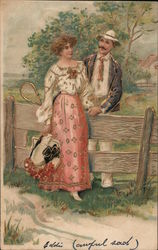 A Man and Woman Standing by a Wooden Fence Couples Postcard Postcard Postcard