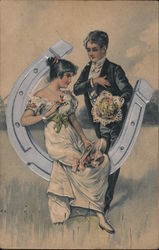 A Man and a Woman With a Horse Shoe and Flowers Postcard