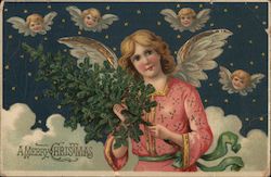 A Merry Christmas - an angel in the sky, holding Christmas tree Angels Postcard Postcard Postcard