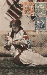 Colorized photograph of a woman working with textiles Postcard