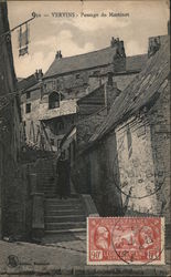 Woman standing in a stairwell in Vervins, France Postcard Postcard Postcard