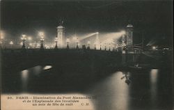 The Pont Alexandre III bridge lit up at night Postcard