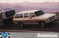 Suburban Pulling an Avion Trailer Postcard