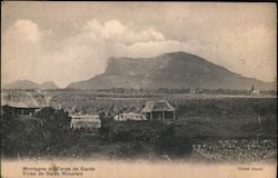 View of a mountain from a Mauritian village Postcard