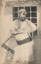 "Mauresque" Moorish Topless woman with head scarf, necklace, lace dress and tambourine Postcard