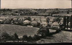 Rows of houses in the English countryside Ashbourne, England Postcard Postcard Postcard