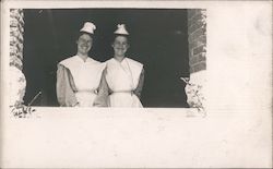 Two Nurses Standing in an Open Window Women Postcard Postcard Postcard