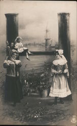 Women standing by letter "H" Postcard