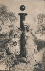 Letter I A Woman and Two Children Standing by a Body of Water Postcard