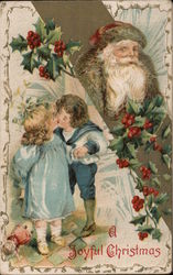 Boy and girl kissing under mistletoe Postcard