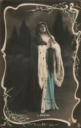 A woman standing in the praying position. Postcard