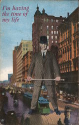 Giant manin suit, standing in busy downtown street, with a trolley passing between his legs Postcard