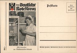 German WWII, Red Cross Nurse at the Medicine Cabinet Postcard