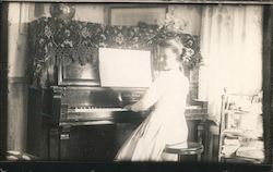 Young Lady Playing Piano Postcard