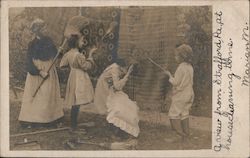 Beating Rugs on the Clothesline Postcard