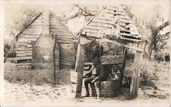 Soldier Sitting on Old Well, Probably Near Parris Island Postcard