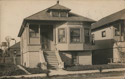 Child sitting in front of house Berkeley, CA Postcard Postcard Postcard