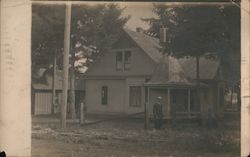 Man Standing in Front of a Small House Camas, WA Postcard Postcard Postcard