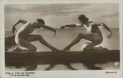 Two nude women posing as if dancers or statues on a platform over a lake Postcard Postcard Postcard