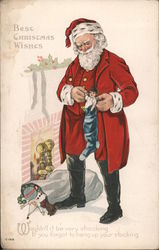 Santa Putting a Doll in a Stocking Postcard