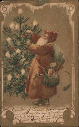 Santa hanging ornaments on the tree Santa Claus Postcard Postcard Postcard