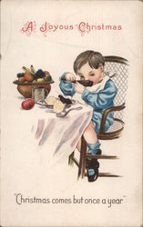 A Joyous Christmas - A Little Boy Eating at a Table Postcard