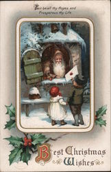 A Boy and Girl Handing Santa a Letter Postcard