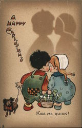 A Happy Christmas -Two Children Giving Each Other a Kiss Postcard