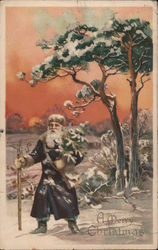 A Merry Christmas - Santa Walking Through the Snow with a Walking Stick Postcard