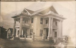 Mansion with two story double columns at side and front with balconies Postcard