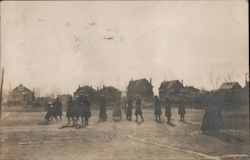 Young people gathered in a courtyard Postcard