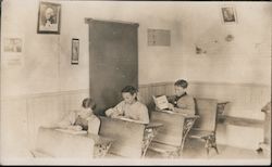 Three children at school desks in classroom Kowanda, NE Postcard Postcard Postcard