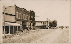 Main street view with dirt road of Western, Neb Nebraska Postcard Postcard Postcard