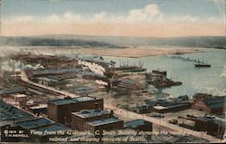 View from the 42 story L.C. Smith Building showing the rapidly growing railroad and shipping interests of Seattle Washington Pos Postcard