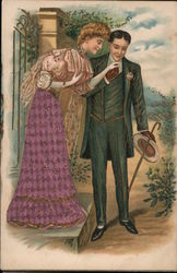 Old fashioned couple courting at an entry gate Postcard