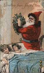 Santa Places Wreath Near Two Sleeping Children Postcard