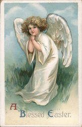 A Blessed Easter - an curly haired angel standing in grass With Angels Ellen Clapsaddle Postcard Postcard Postcard