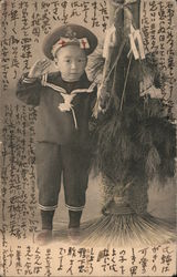 Toddler Japanese boy in a sailor's suit and saluting Postcard