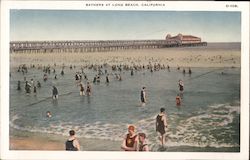 Bathers at beach, pier Postcard