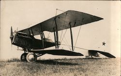 Biplane, star on tail, two seater Postcard